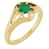 Bague Belcher en or jaune 14 carats avec émeraude naturelle.