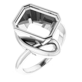 Bague sertie d'une émeraude blanche 18 carats de 11 x 9 mm