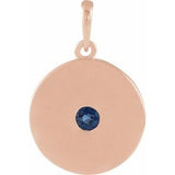 Pendentif disque en or rose 14 carats et saphir bleu naturel