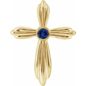 Pendentif croix en or jaune 14 carats et saphir bleu naturel