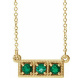 Collier trois pierres en or jaune 14 carats serti d'une émeraude de laboratoire (16-18 pouces)