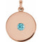 Pendentif disque en or rose 14 carats et zircon bleu naturel