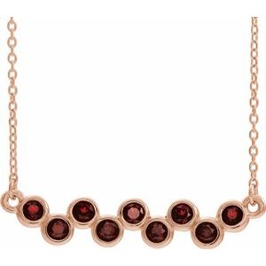 Collier en or rose 14 carats serti clos d'un grenat naturel du Mozambique, 40-45 cm