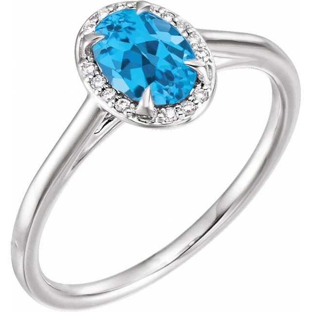 Bague en or blanc 14 carats avec topaze bleue suisse naturelle de 7 x 5 mm et diamants naturels (0,03 carat au total).
