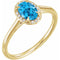 Bague en or jaune 14 carats avec topaze bleue suisse naturelle de 7 x 5 mm et diamants naturels (0,03 carat au total).