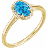 Bague en or jaune 14 carats avec topaze bleue suisse naturelle de 7 x 5 mm et diamants naturels (0,03 carat au total).