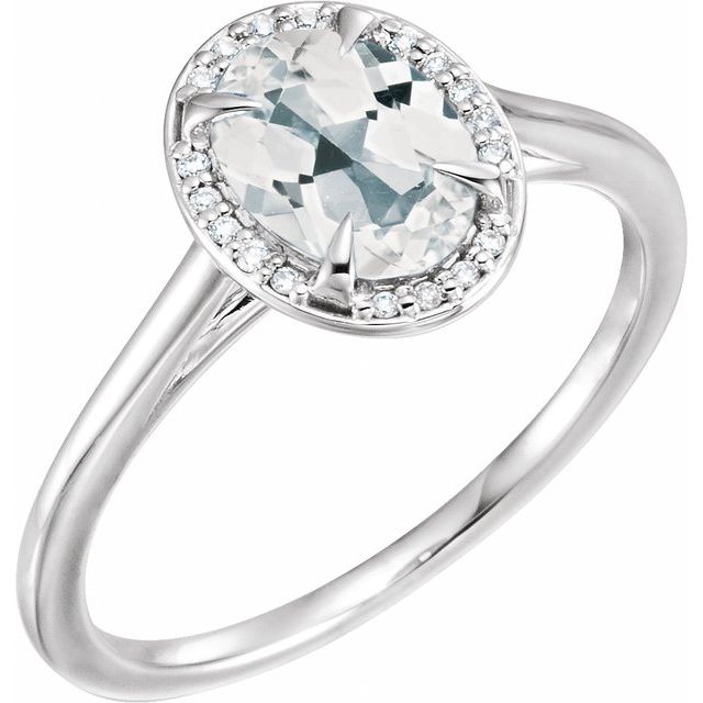Bague en or blanc 14 carats avec topaze blanche ovale 8x6 mm et diamants (0,05 carat au total).