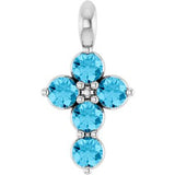 Pendentif croix en platine et aigue-marine naturelle