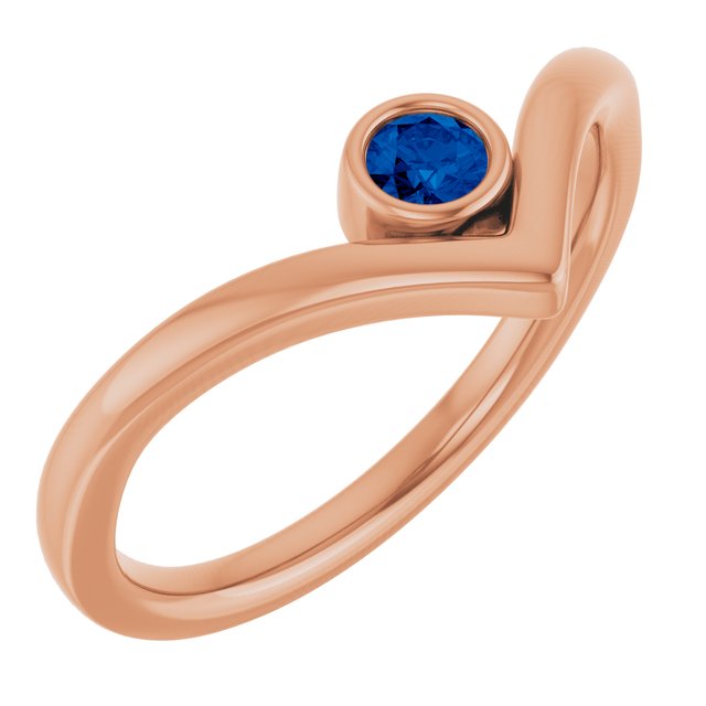 Bague en V sertie d'un saphir bleu de laboratoire rose 14 carats