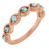 Bague empilable en or rose 14 carats et zircon bleu naturel