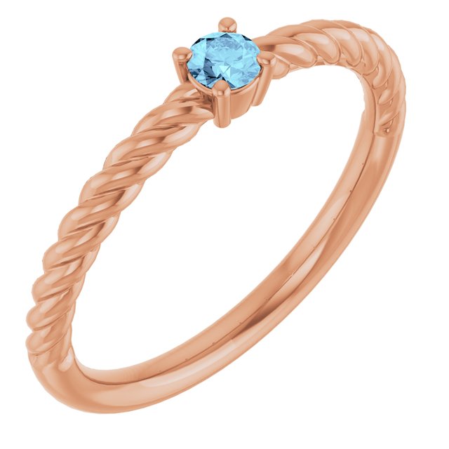 Bague solitaire en or rose 14 carats avec aigue-marine naturelle de 3 mm, sertie sur corde.