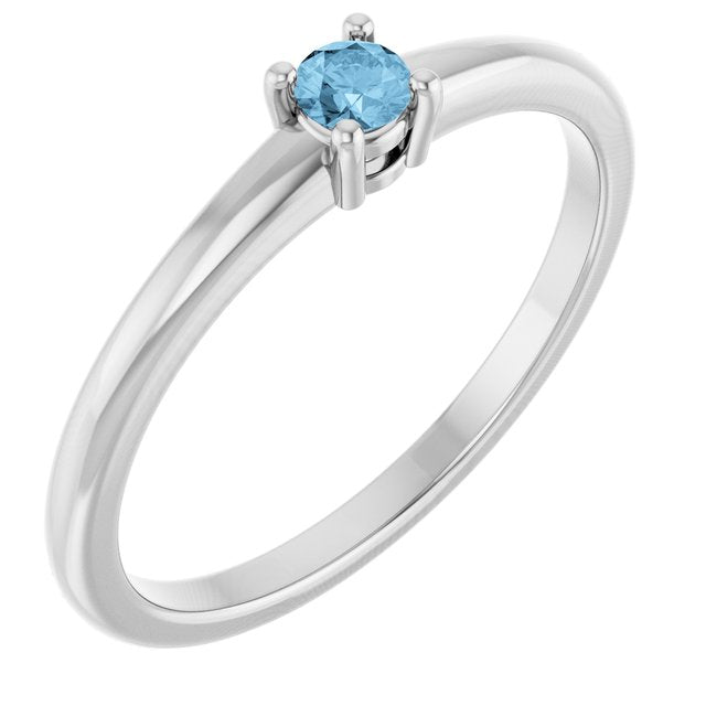 Bague en platine et topaze bleu ciel naturelle