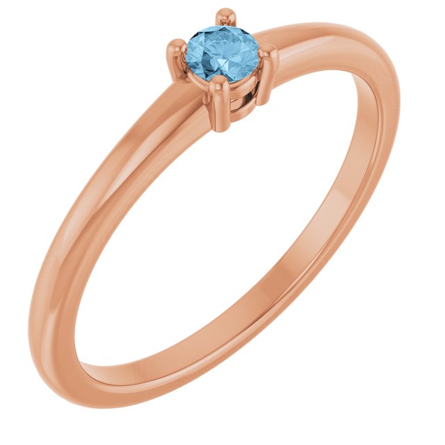 Bague en or rose 14 carats avec topaze bleu ciel naturelle