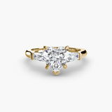 Bague trois pierres (pierres latérales baguette)