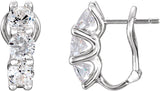 Boucles d'oreilles Omega à trois pierres
