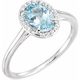 Bague en or blanc 14 carats avec aigue-marine naturelle de 8 x 6 mm et diamants naturels (0,04 carat au total).