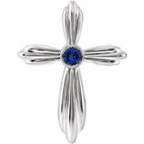 Pendentif croix en platine et saphir bleu naturel