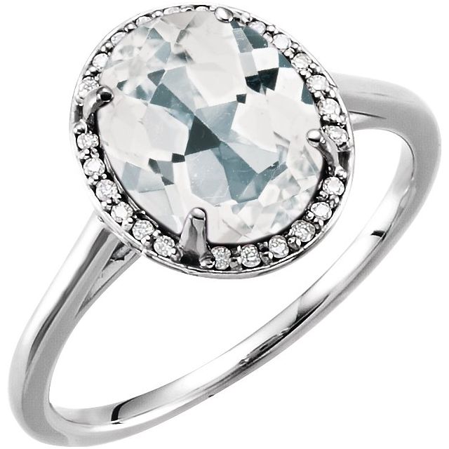 Bague en or blanc 14 carats avec topaze blanche ovale 10x8 mm et diamants (0,06 carat au total).