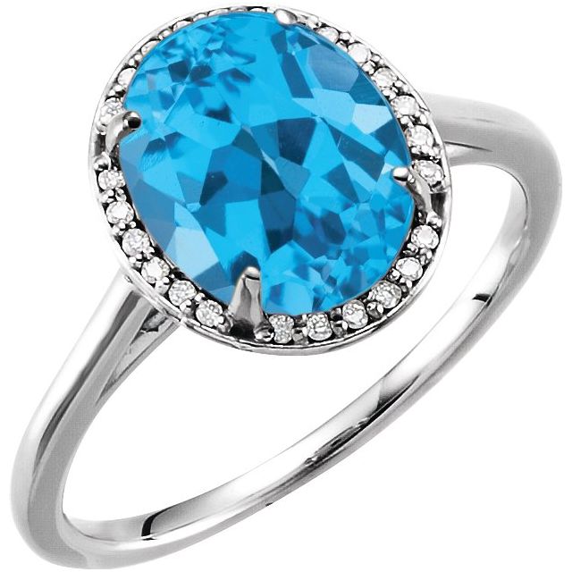 Bague en or blanc 14 carats, topaze bleue suisse naturelle 10x8 mm et diamants naturels (0,06 carat au total).