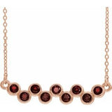 Collier en or rose 14 carats serti clos d'un grenat naturel du Mozambique, 40-45 cm