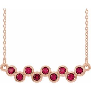 Collier en or rose 14 carats serti clos de rubis naturels et barrette de 40 à 45 cm