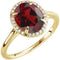 Bague en or jaune 14 carats sertie d'un grenat naturel du Mozambique de 10 x 8 mm et de diamants naturels (0,06 carat au total).