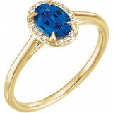 Bague en or jaune 14 carats sertie d'un saphir bleu de laboratoire de 7 x 5 mm et de diamants naturels (0,03 carat au total).