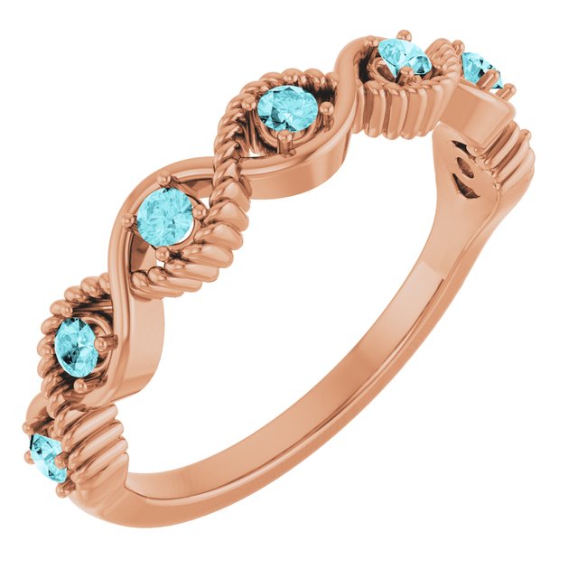 Bague empilable en or rose 14 carats et zircon bleu naturel