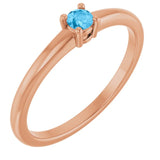Bague en or rose 14 carats avec topaze bleue suisse naturelle