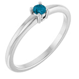 Bague en platine et topaze bleue naturelle de Londres