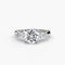 Bague trois pierres (pierres latérales baguette)